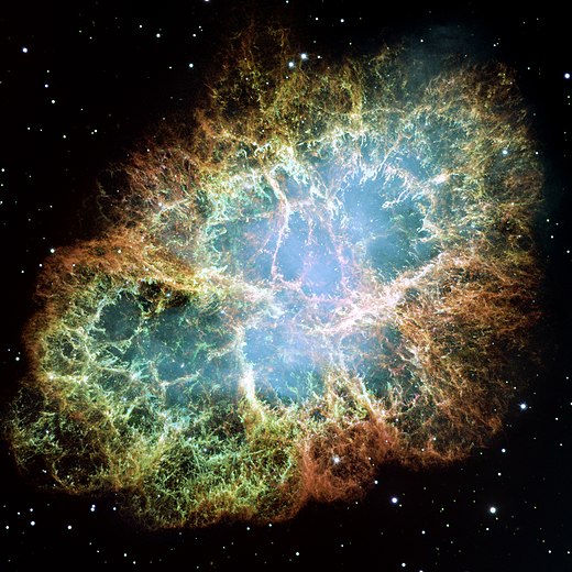 A colored photo of the Crab Nebula.